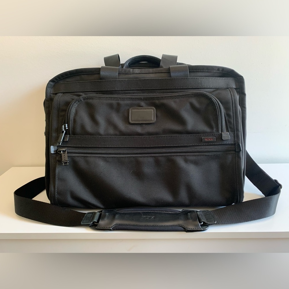 Tumi Black Travel Bag with Adjustable Strap